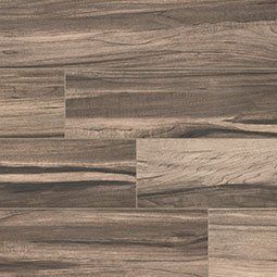Wood-look tile flooring in varying shades of brown, with horizontal plank design.