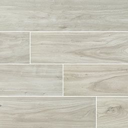 Light gray wood-look tile floor with various plank lengths and white grout lines.