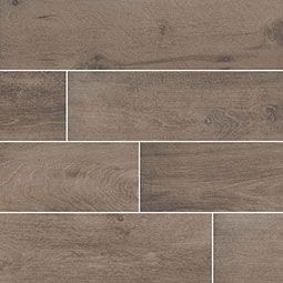 Brown wood-look tile, with various sizes and textures, arranged in a staggered pattern, white grout lines.