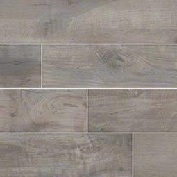Gray wood-look tile flooring with visible grain patterns and white grout lines between the tiles.