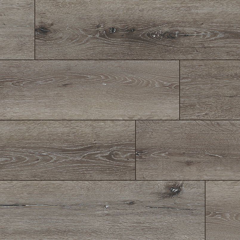 Gray wood flooring with visible grain and knots.