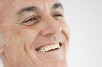 Man with denture repair smiling