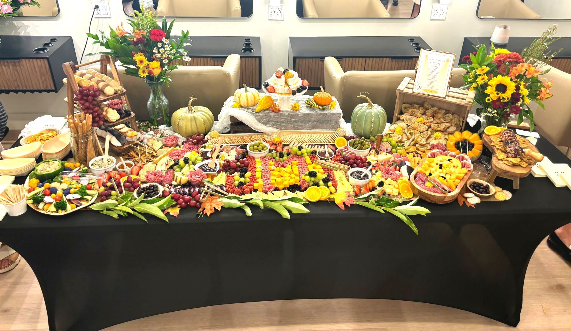 A large tray of food is sitting on top of a table.