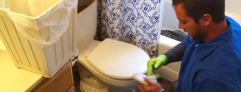 cleaning the toilet