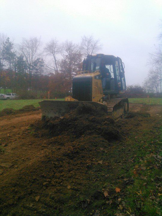 Excavating For Landscaping — Truck Digging Soil  in Slippery Rock, PA