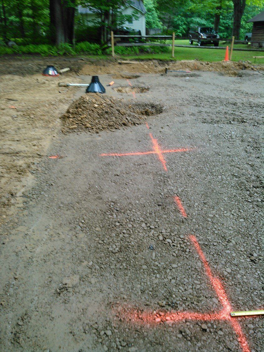 Excavating — Backyard With Lines And Holes in Slippery Rock, PA