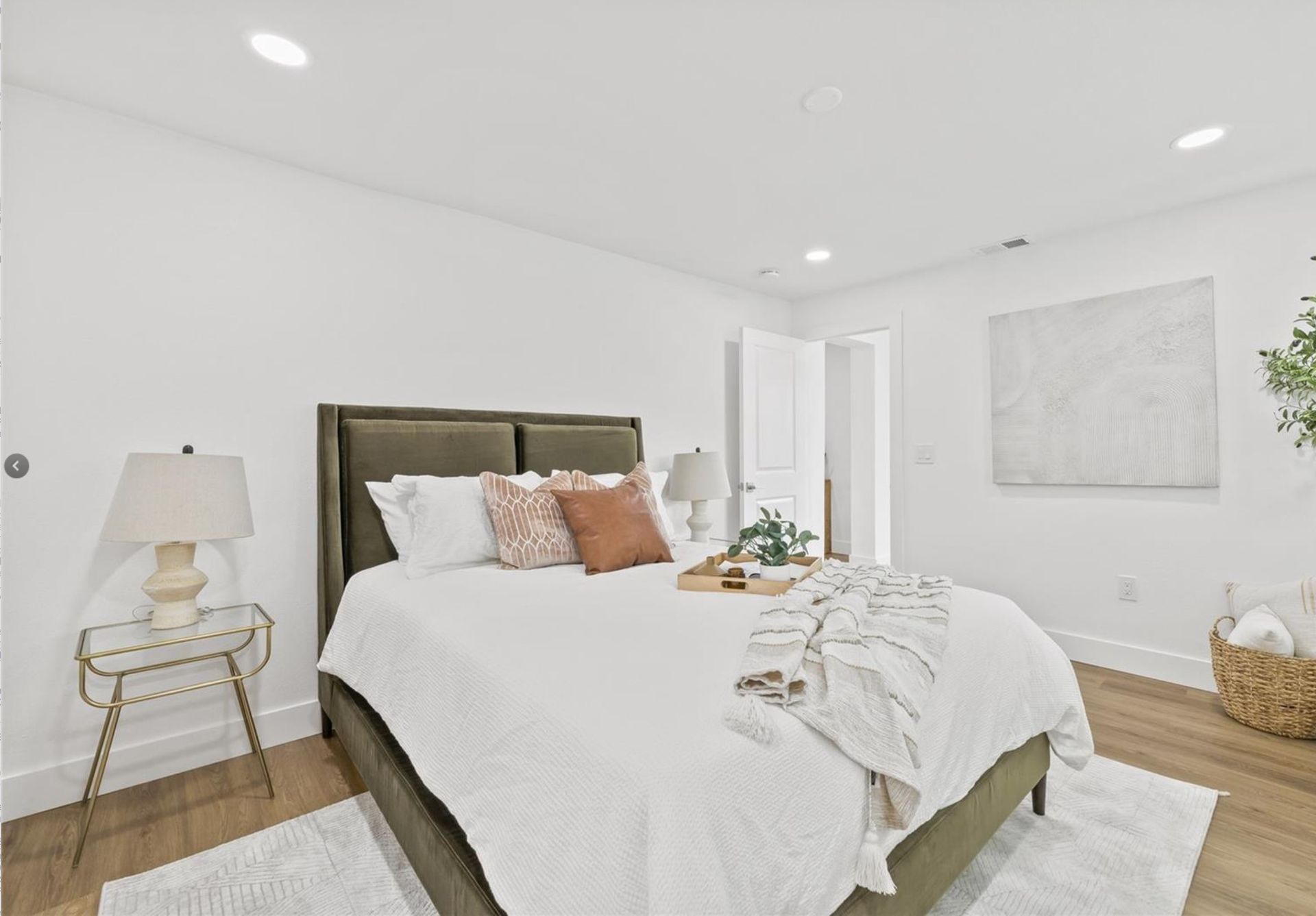 There is a large bed in the middle of the room.