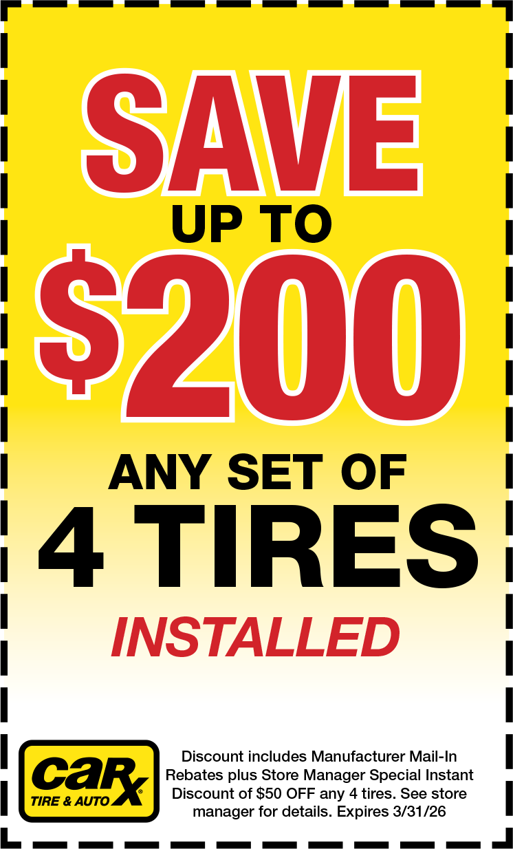 Yellow sign: Save up to $200 on any set of 4 tires installed. Carx Tire & Auto logo.