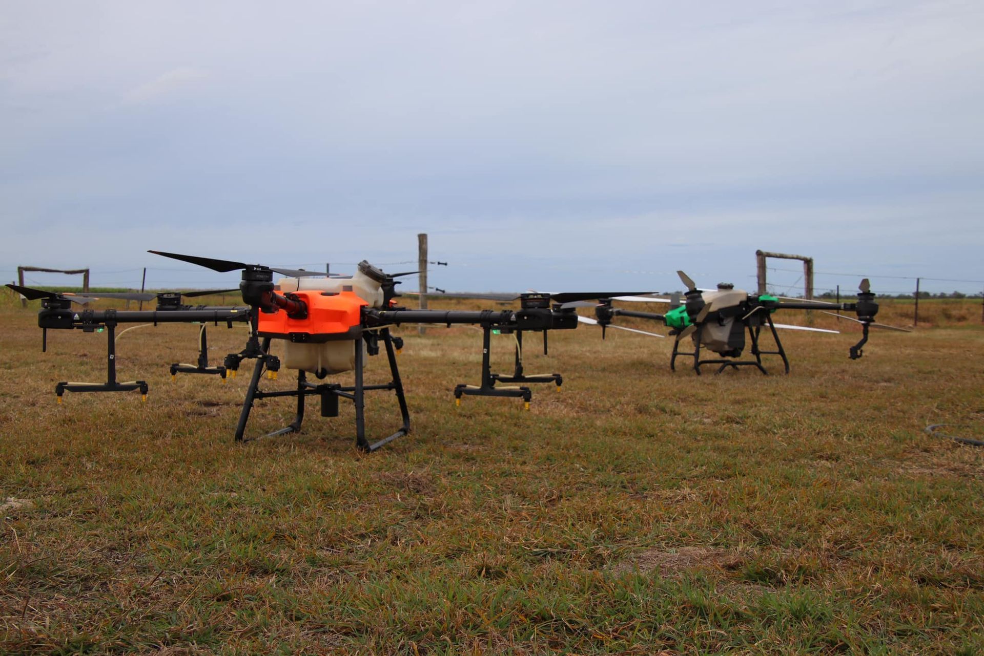 Two Agricultural Drones on A Grassy Field — Jetstream Aerial Services in Te Kowai, QLD