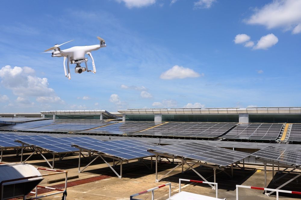 Drone Flying Over Solar Panels Under a Partly Cloudy Sky — Jetstream Aerial Services in Te Kowai, QLD
