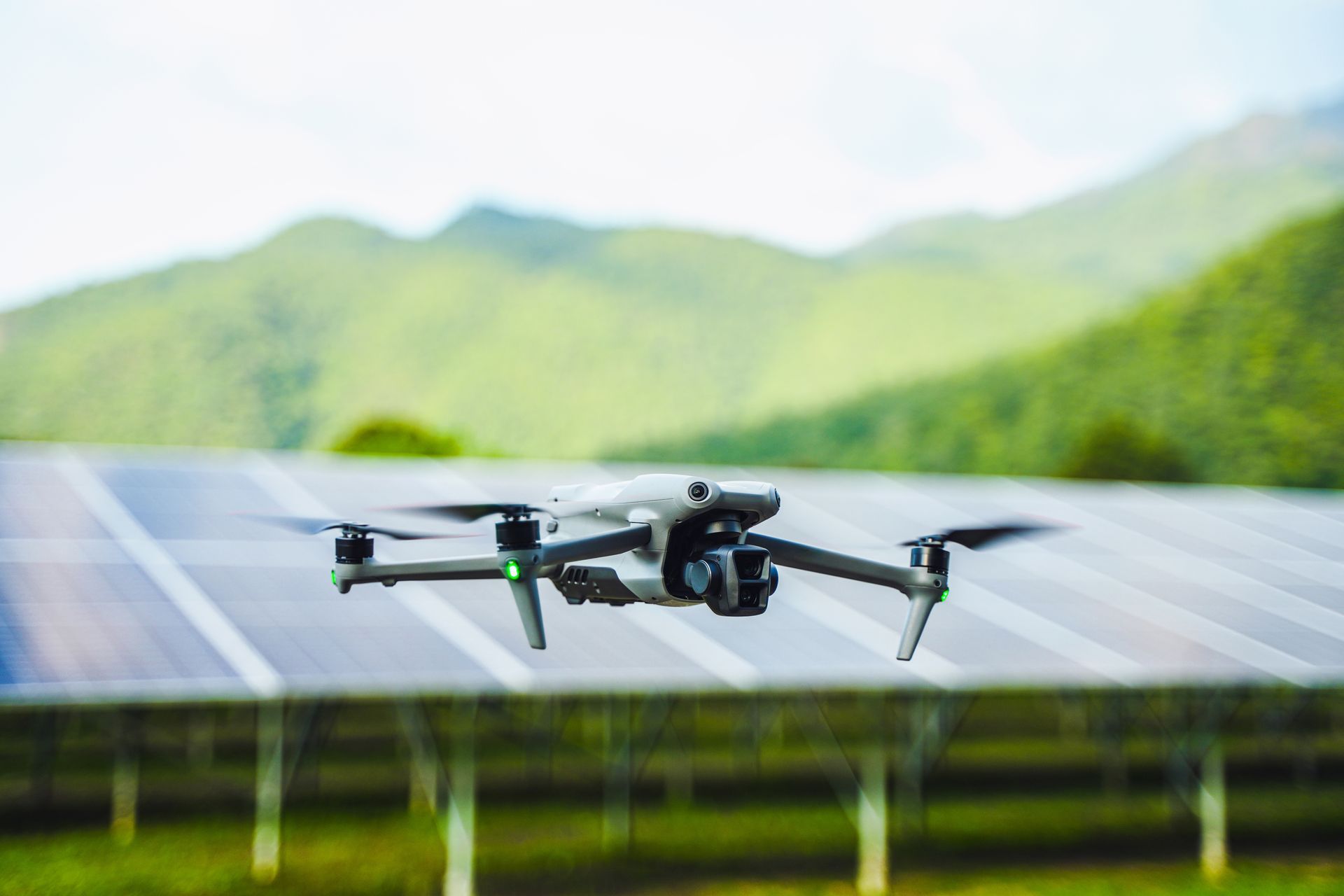 Drone Flying Over Solar Panels with A Mountain Backdrop — Jetstream Aerial Services in Te Kowai, QLD