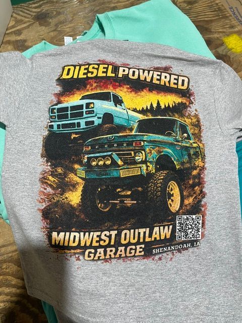 Gray t-shirt featuring two diesel trucks, flames, and the text