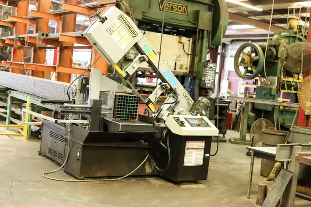 Machine Cutting Metal In A Factory — Wills Point, TX — R -5 Metal Fabricators Inc