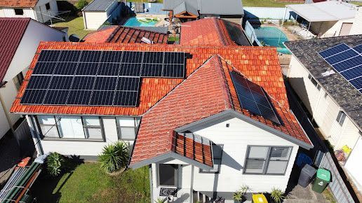 Installed Solar Cell On The Red Roof — PRO Solar & Electrical In Maitland, NSW