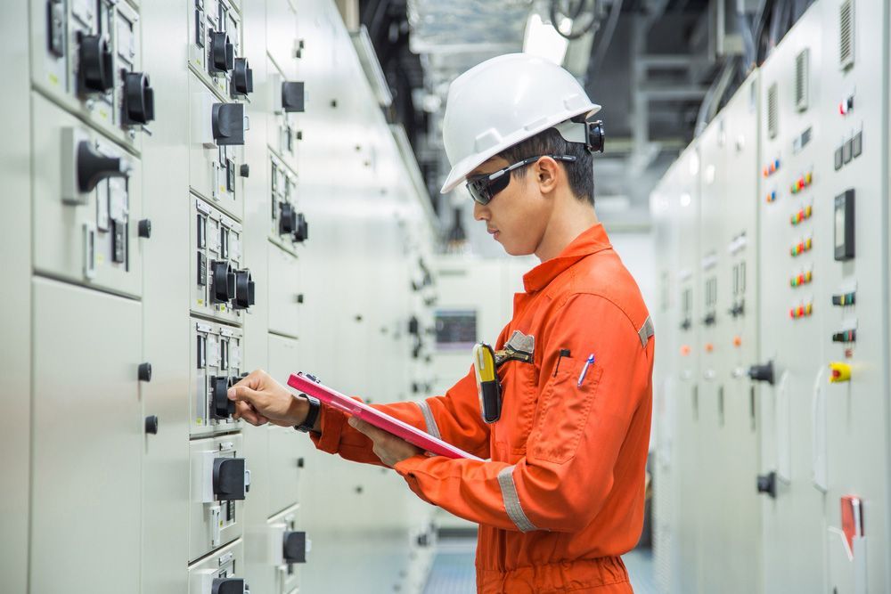 Electrician Checking Power Board In Power Station — PRO Solar & Electrical In Port Stephens, NSW