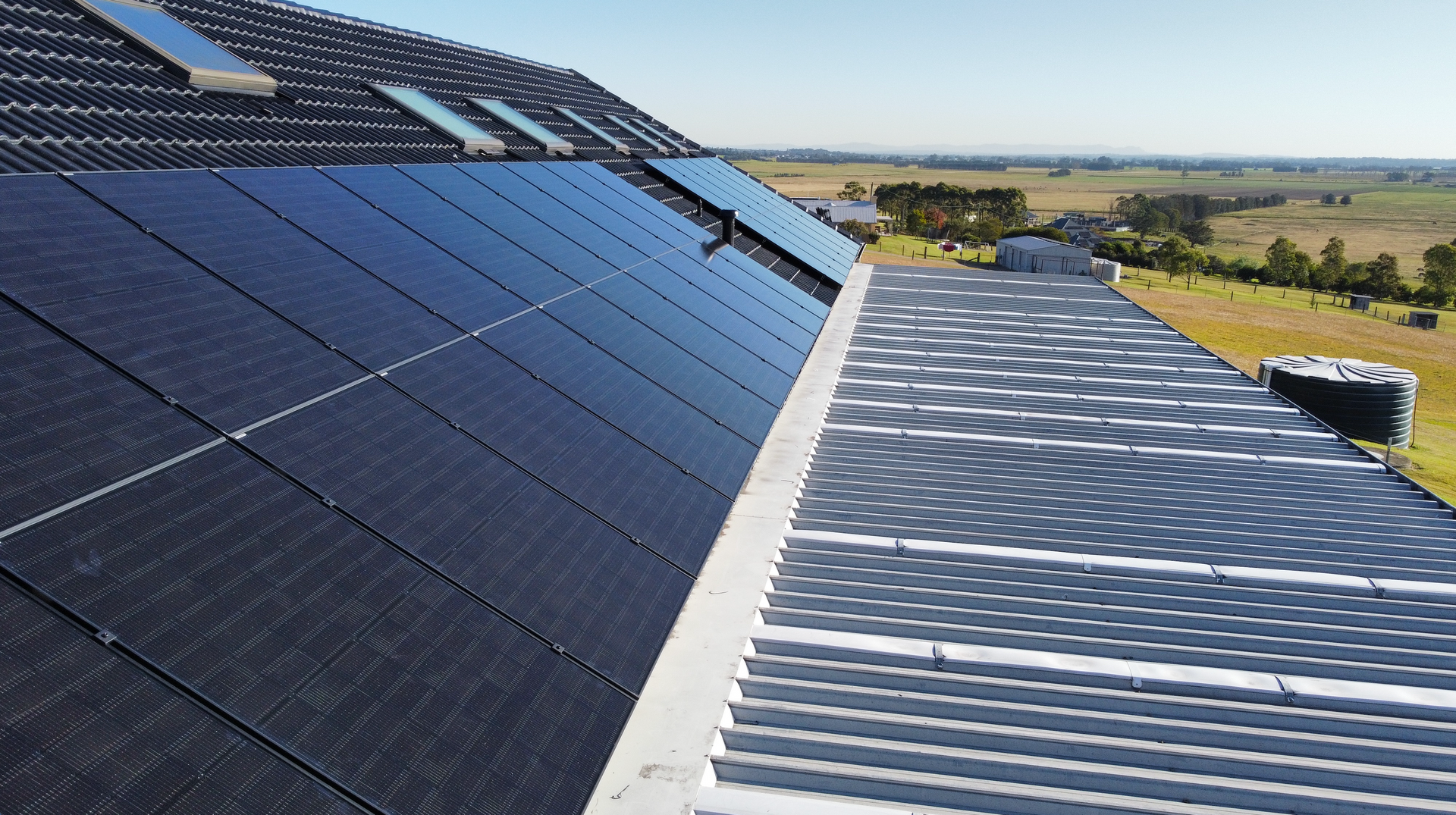 Blue Sky Is Reflected On The Solar Panels — PRO Solar & Electrical In Port Stephens, NSW