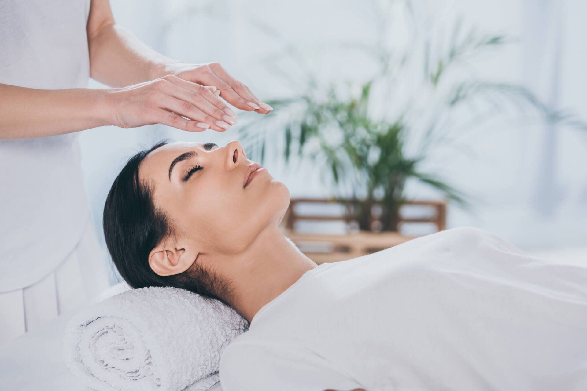 Woman Receiving Reiki Treatment — Milwaukee, WI — Infinity Massage