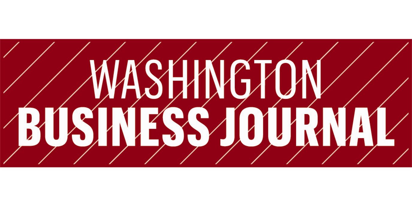The logo for the washington business journal is red and white.