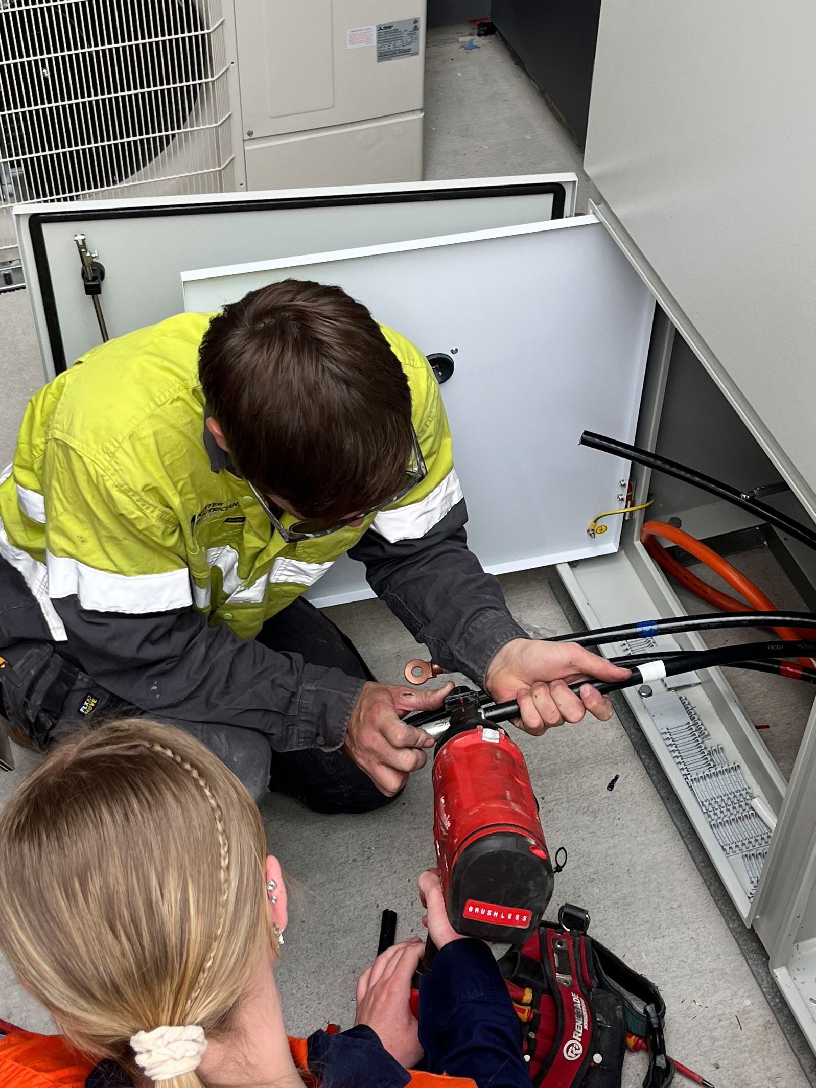 Electrician Completing Industrial Electrical Job — Paton's Electrical Services in Urangan, QLD