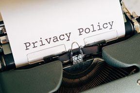 Privacy Policy text typed on paper