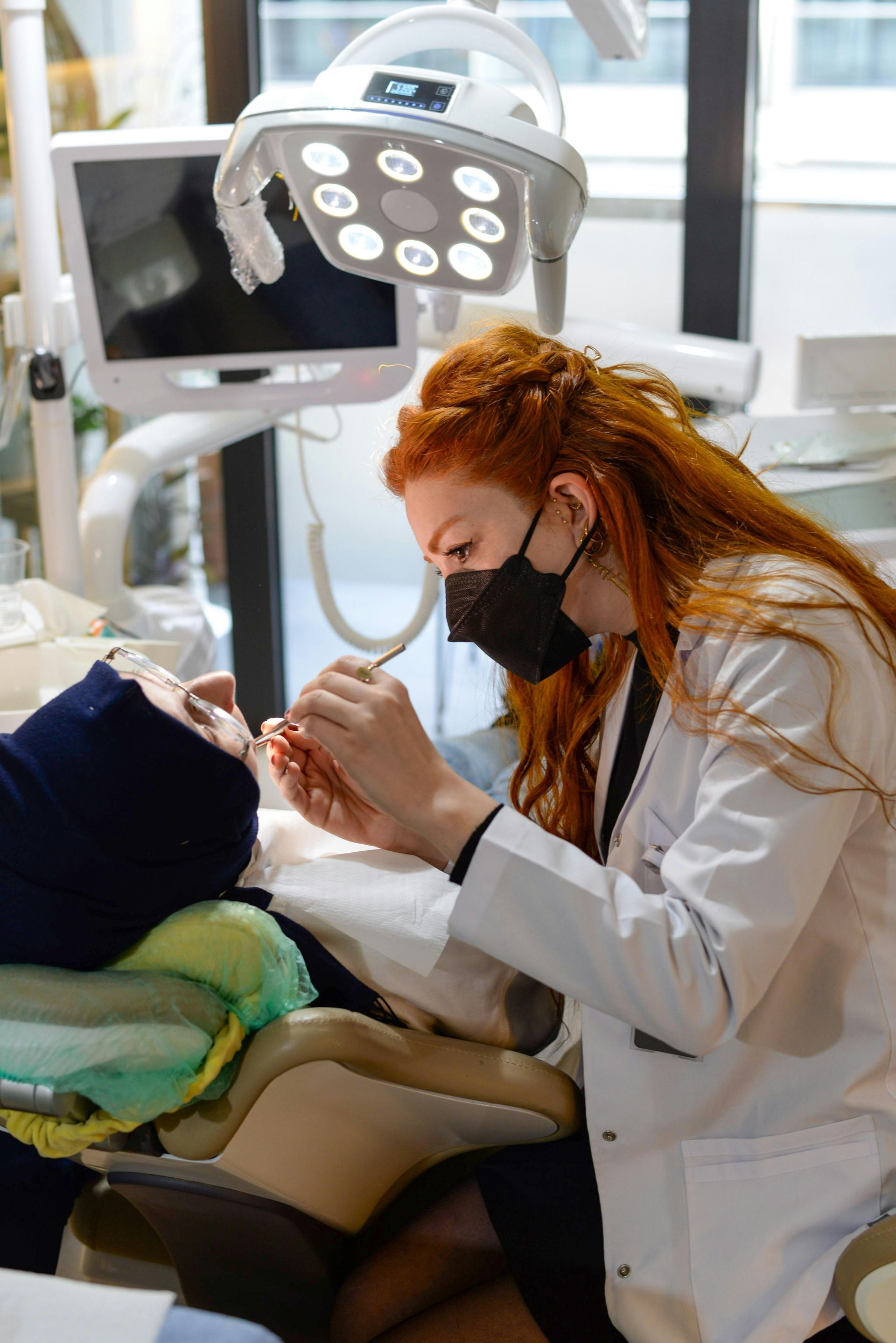 Image of dental hygienist and patient