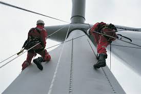 Men Working in Wind Turbine