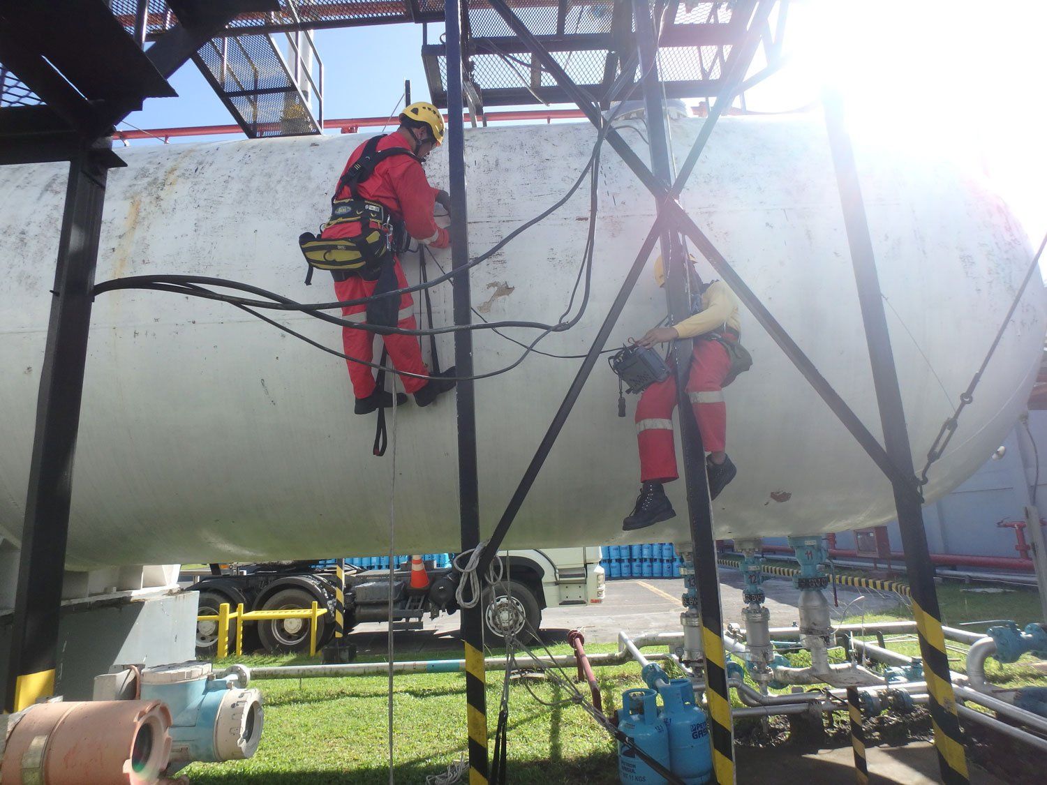 Men Working Bullet Tank