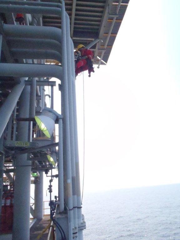 Men Working with Yellow Cap for inspection services