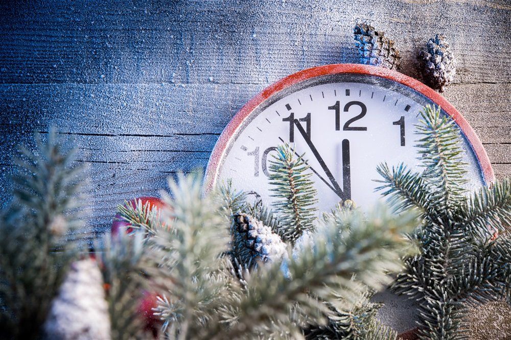 clock with spruce tree clippings