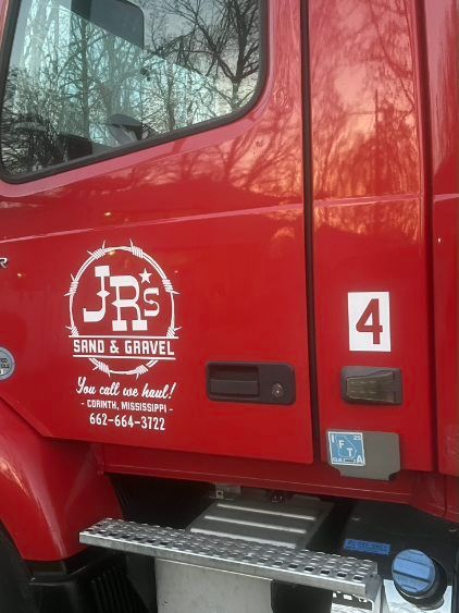 Red JRS School & Event bus side panel with number 4 and step up platform