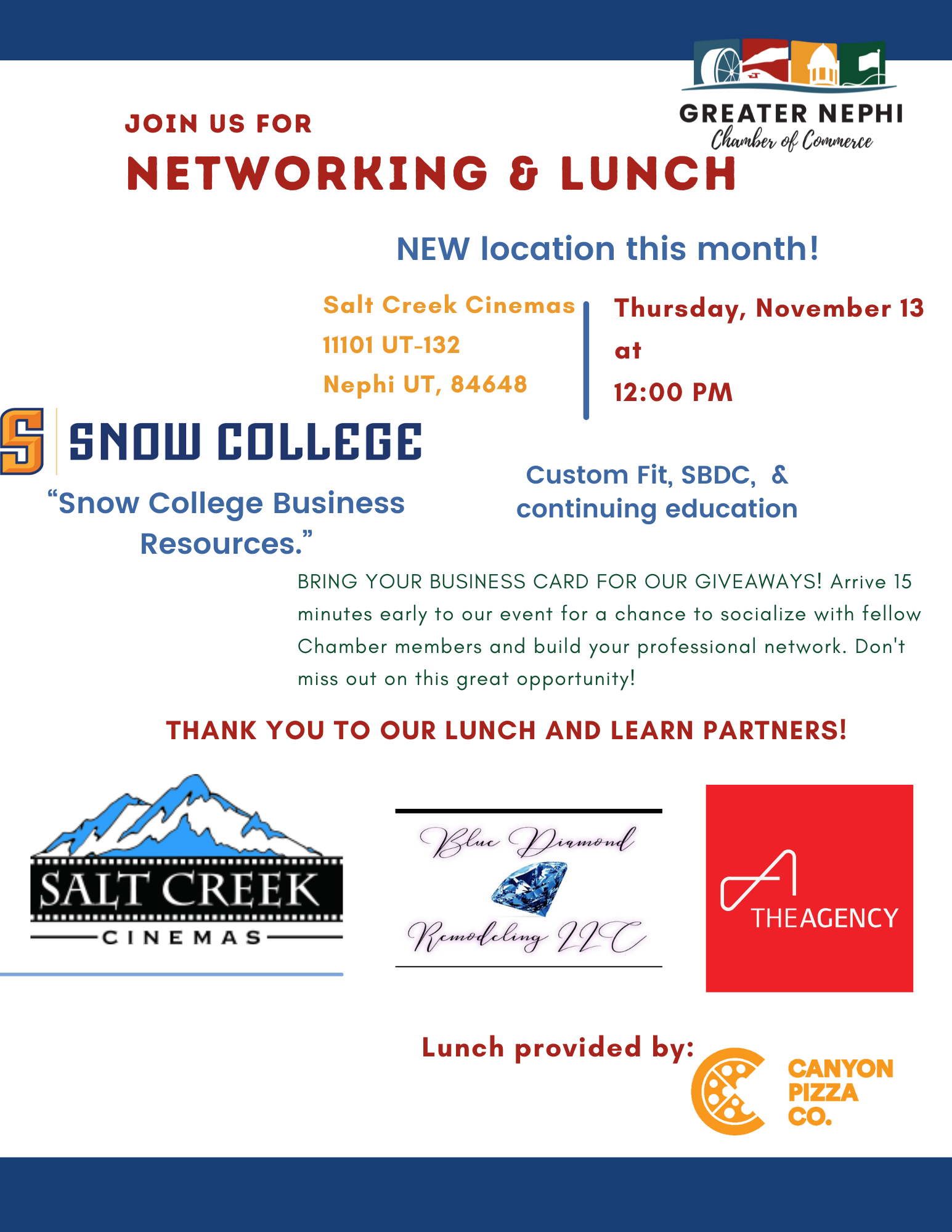 A man in a suit and plaid shirt is smiling for the camera.