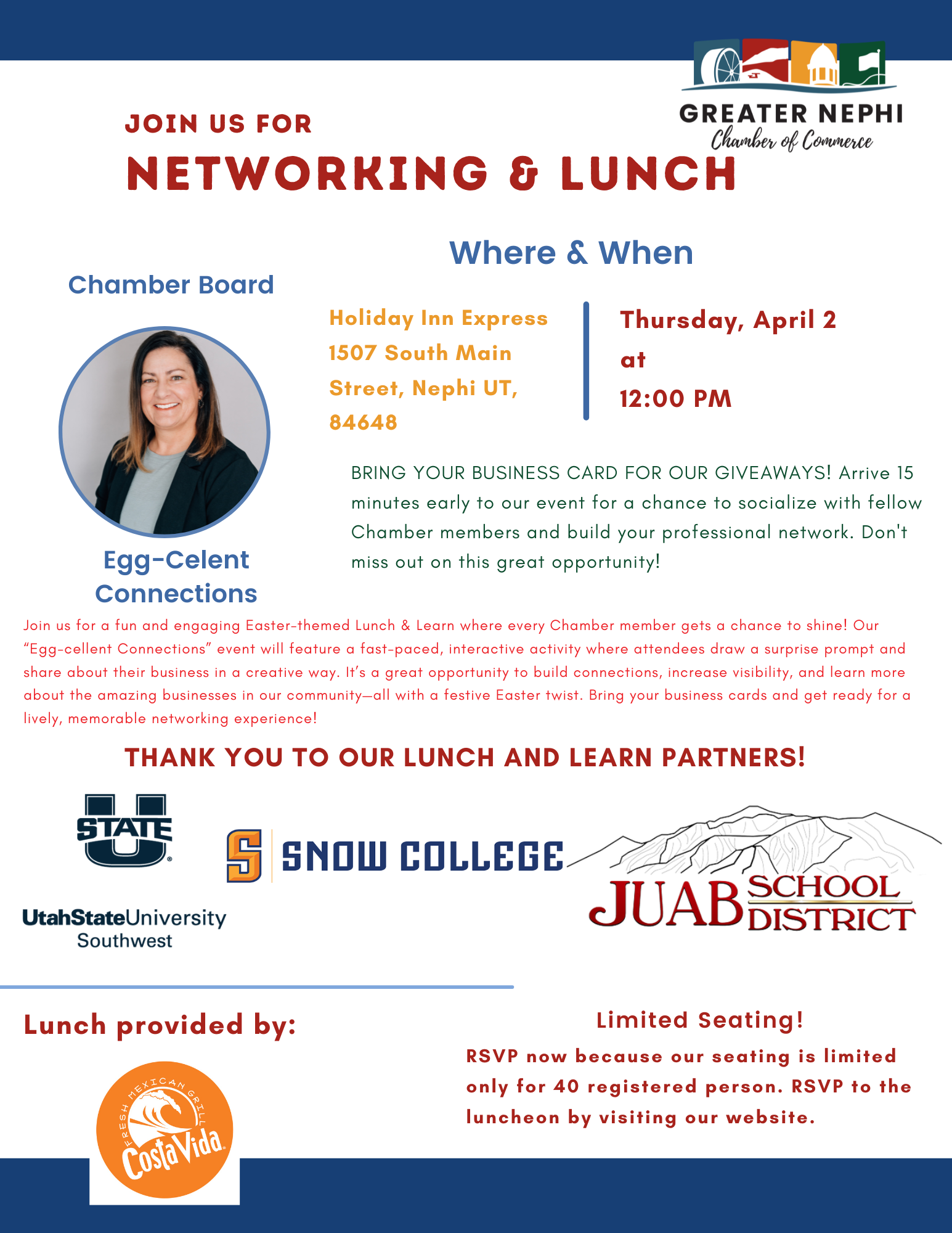 A man in a suit and plaid shirt is smiling for the camera.