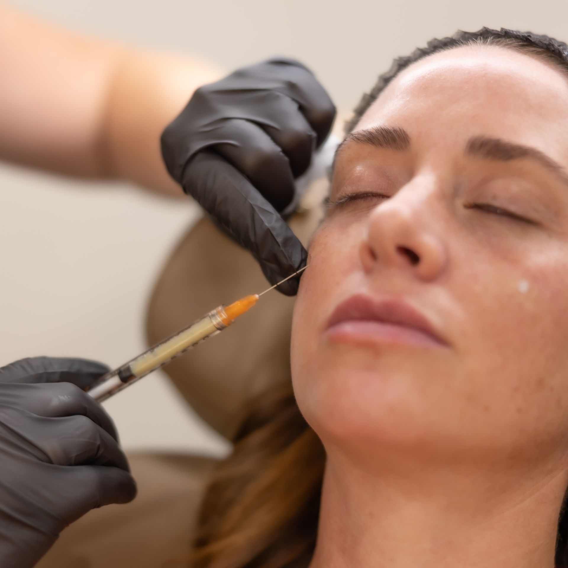 Woman being injected with dermal fillers