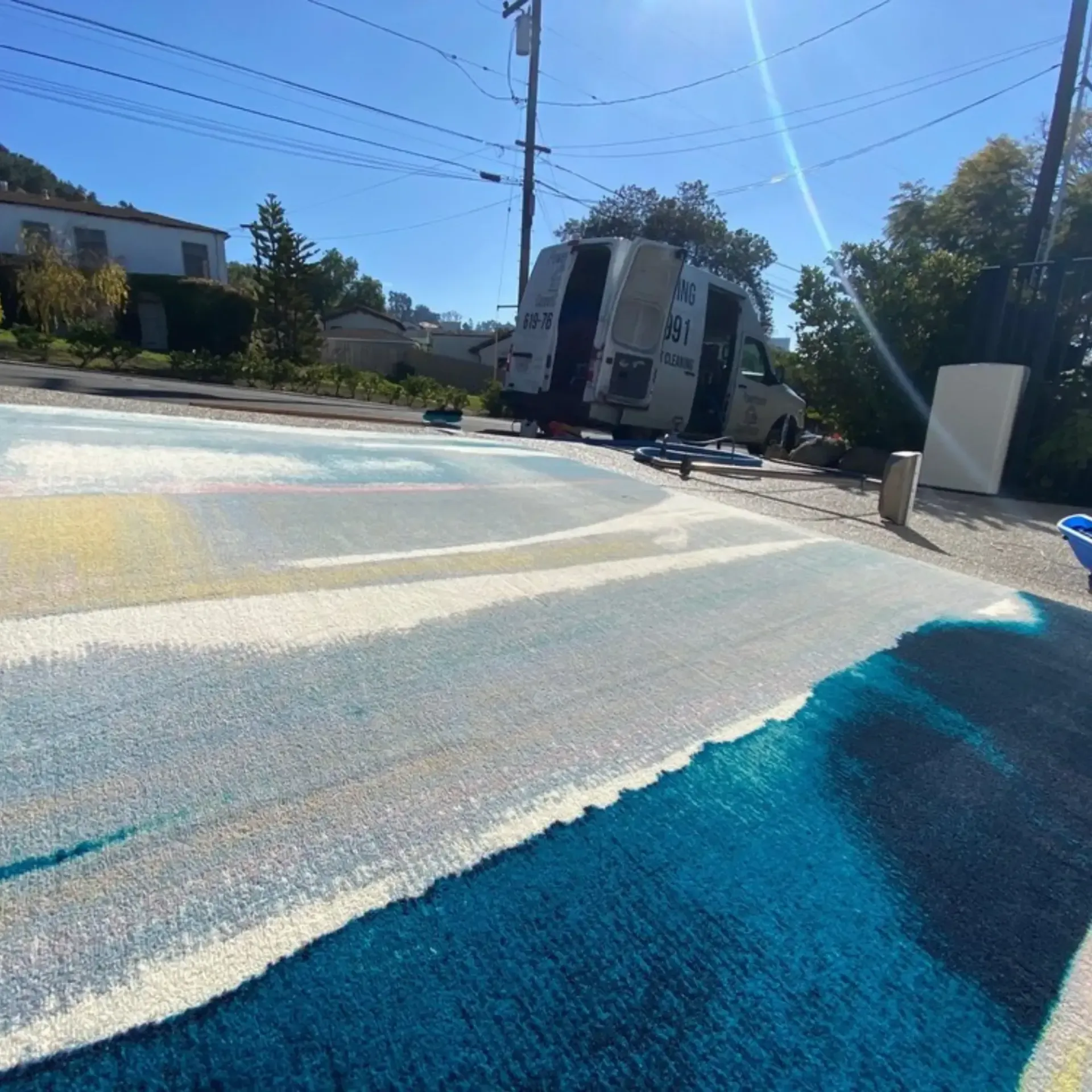 Powerhouse Carpetcleaning - A white van is parked on the side of the road