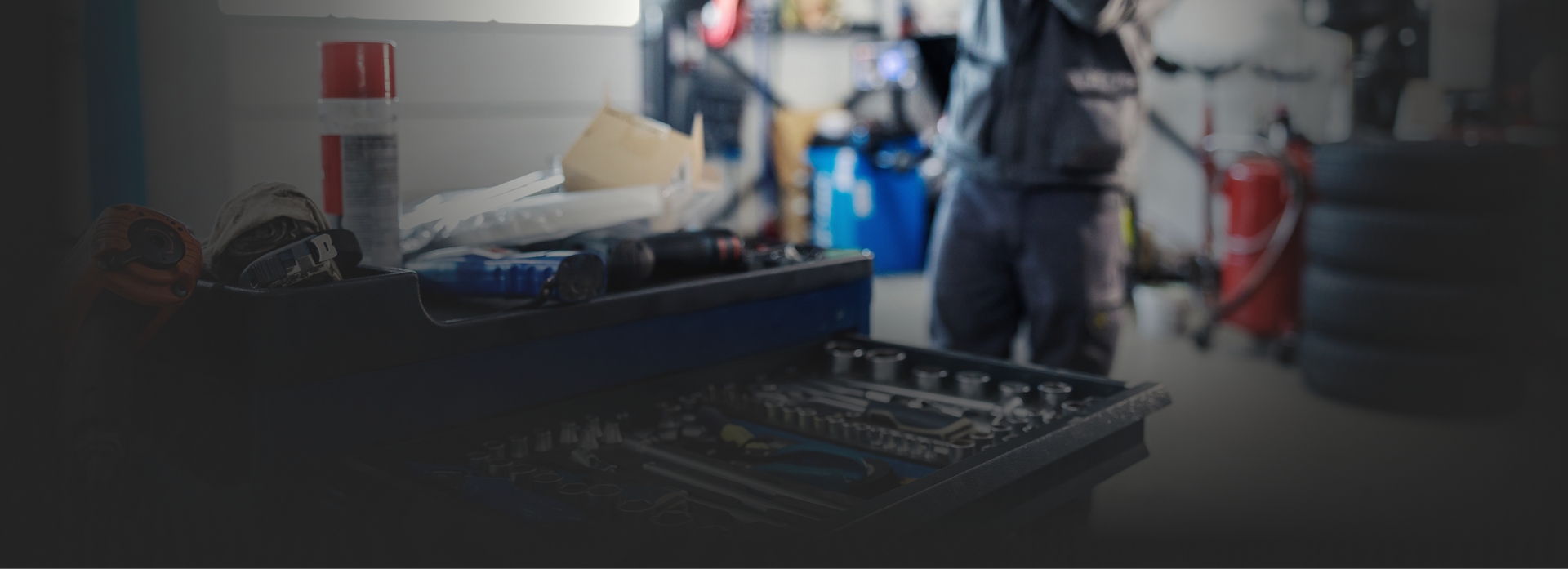 A mechanic working in a garage.| Roper Mountain Auto Care