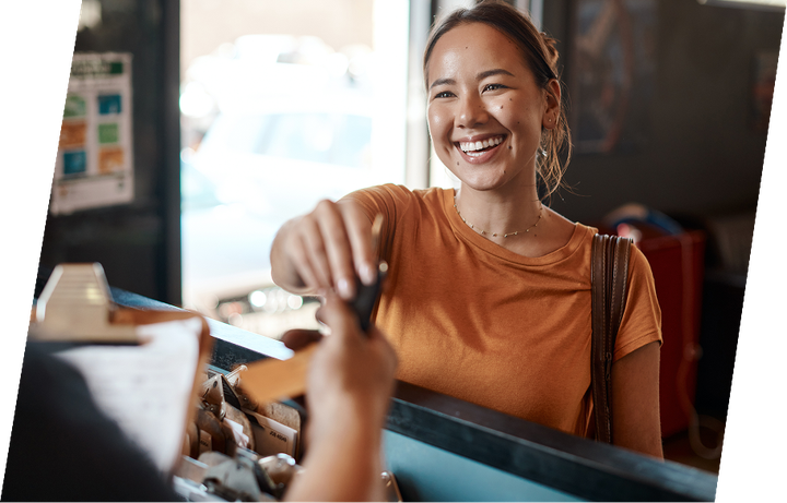 Mechanic shaking hands with a customer in a garage | Roper Mountain Auto Care