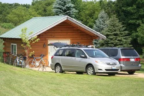 Cabin and Vehicles — Wilton, WI — Tunnel Trail Campground