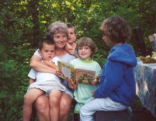 Child Reading a Book — Wilton, WI — Tunnel Trail Campground