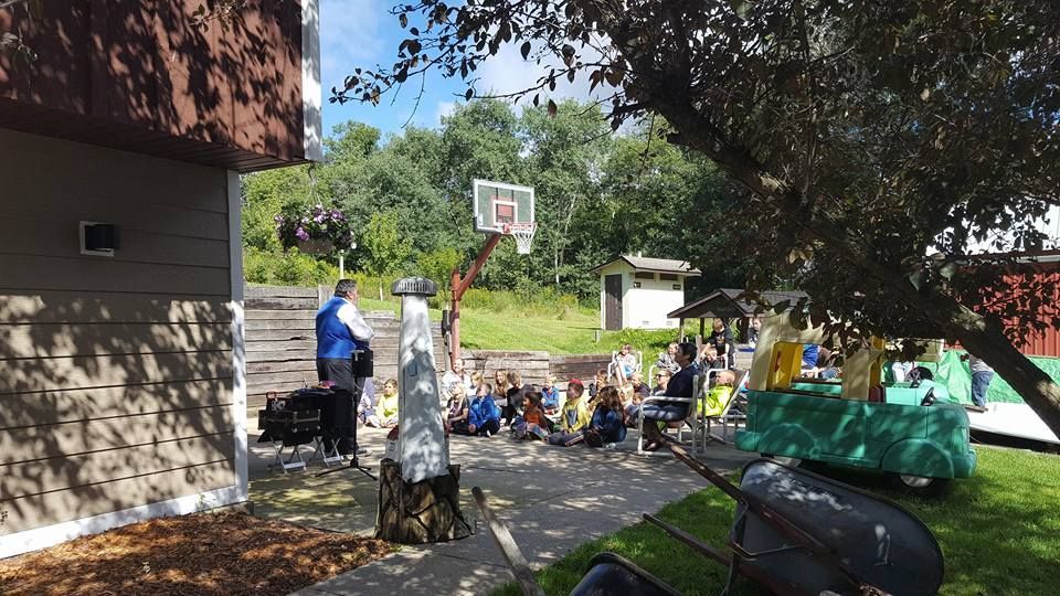 Man Talking to Kids — Wilton, WI — Tunnel Trail Campground