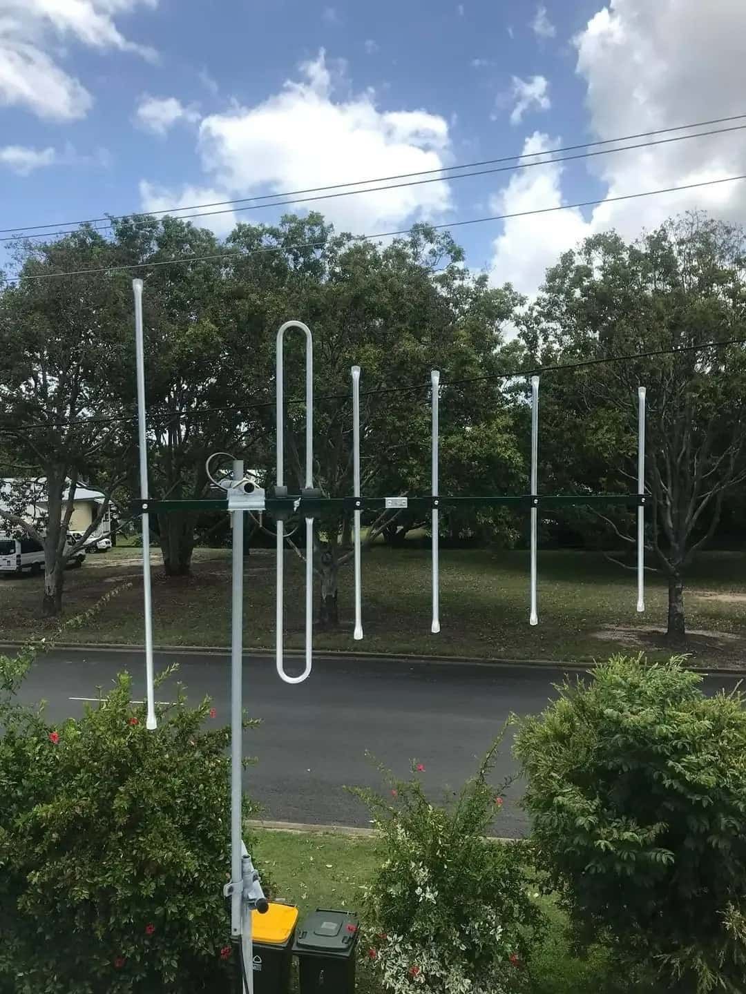 A Row Of Antennas Are Sitting On The Side Of A Road — Bradshaws Radio & TV Service In Hervey Bay, QLD