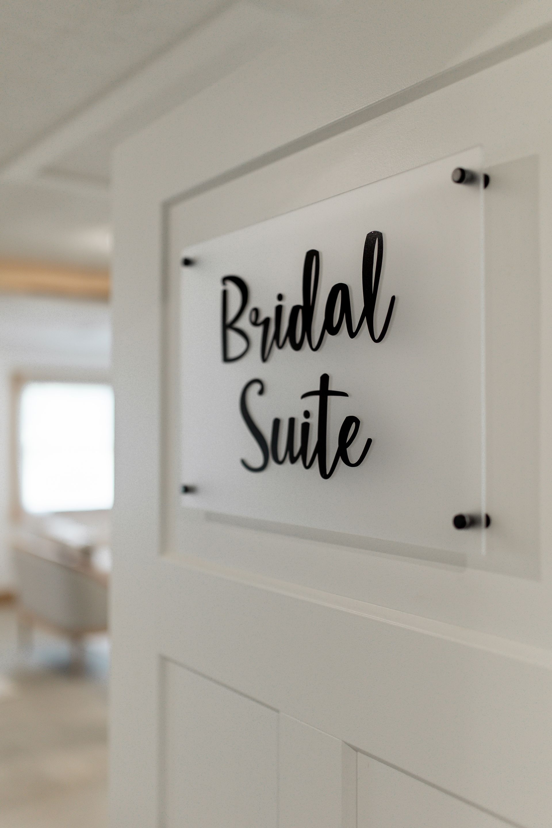 A sign on a door that says bridal suite