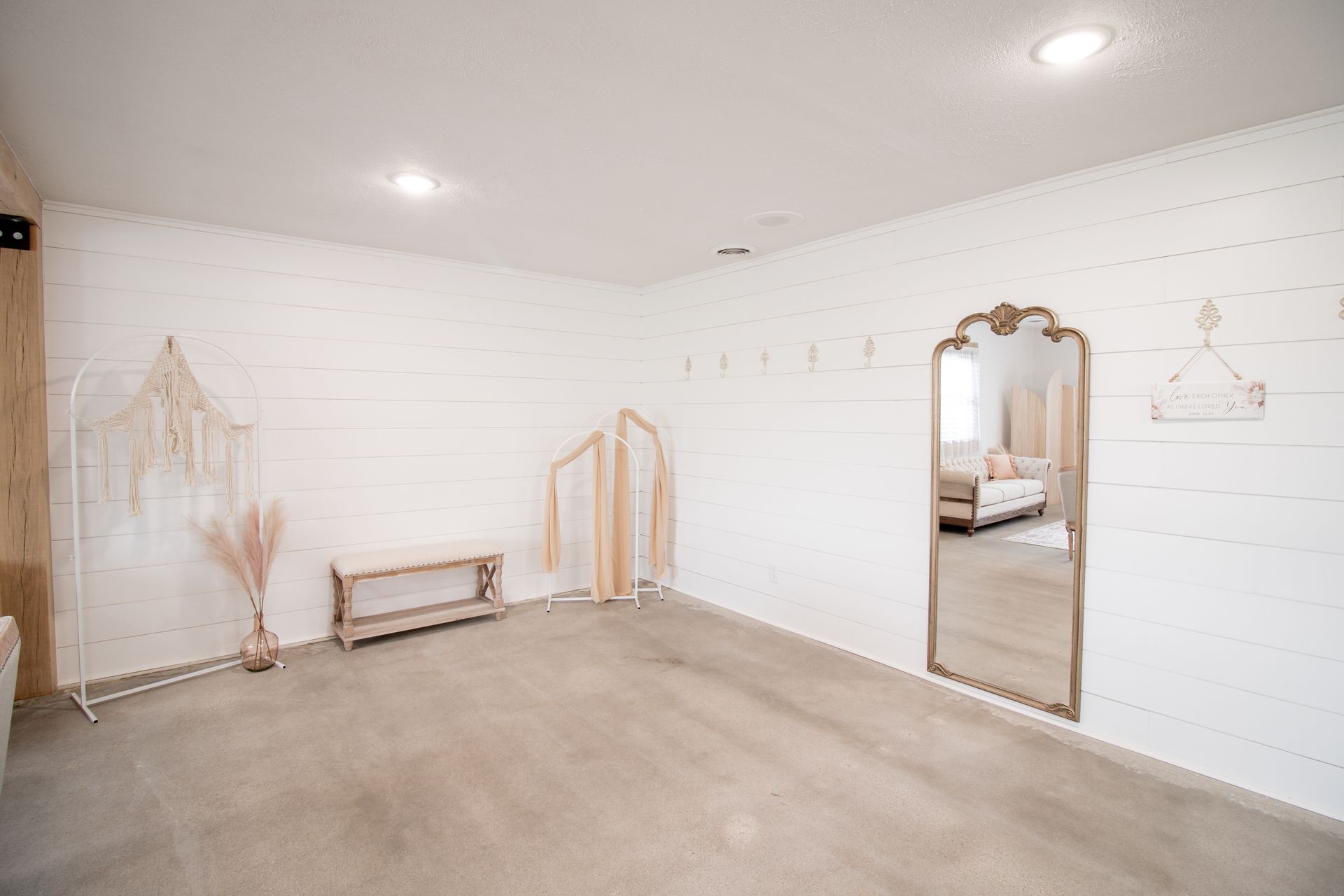 There is a large mirror in the middle of the room.