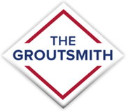 The logo for the groutsmith is a diamond shape