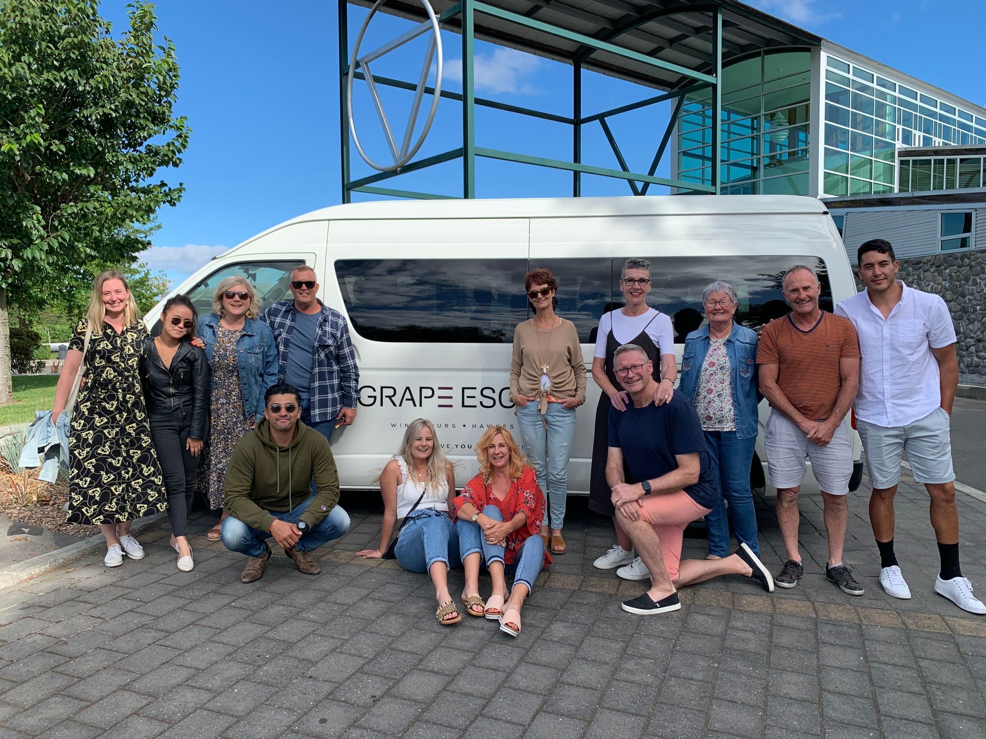 Group photo of tour group travelling with Grape Escape Wine Tours