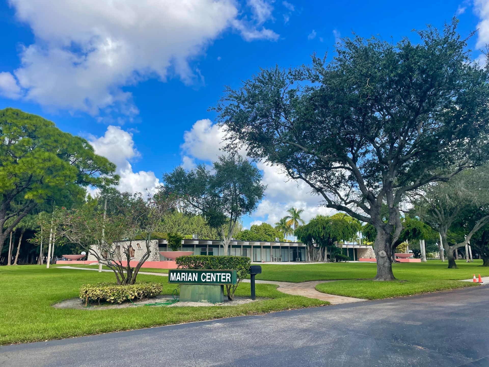 A house with a large planter in front of it
