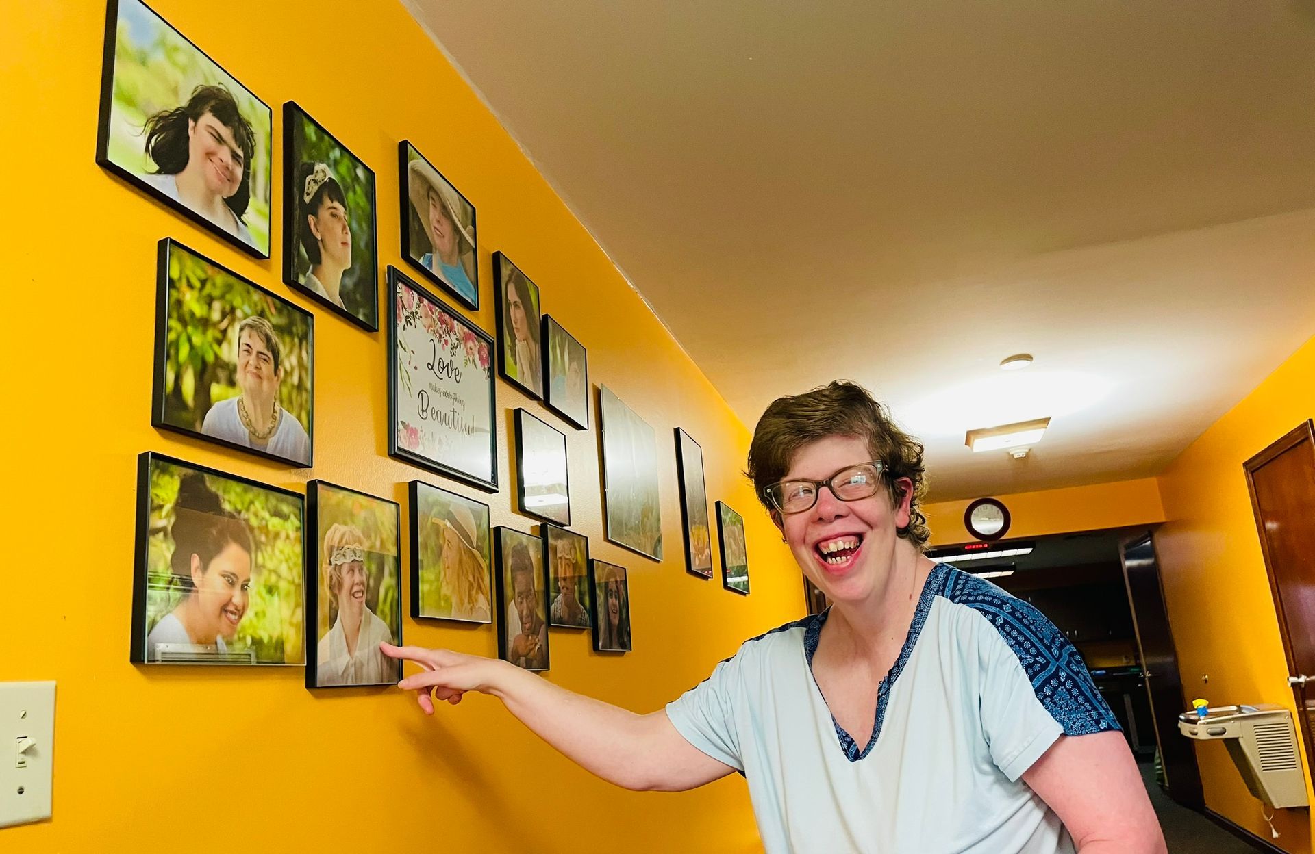 A red carpet is leading to the front door of a house.