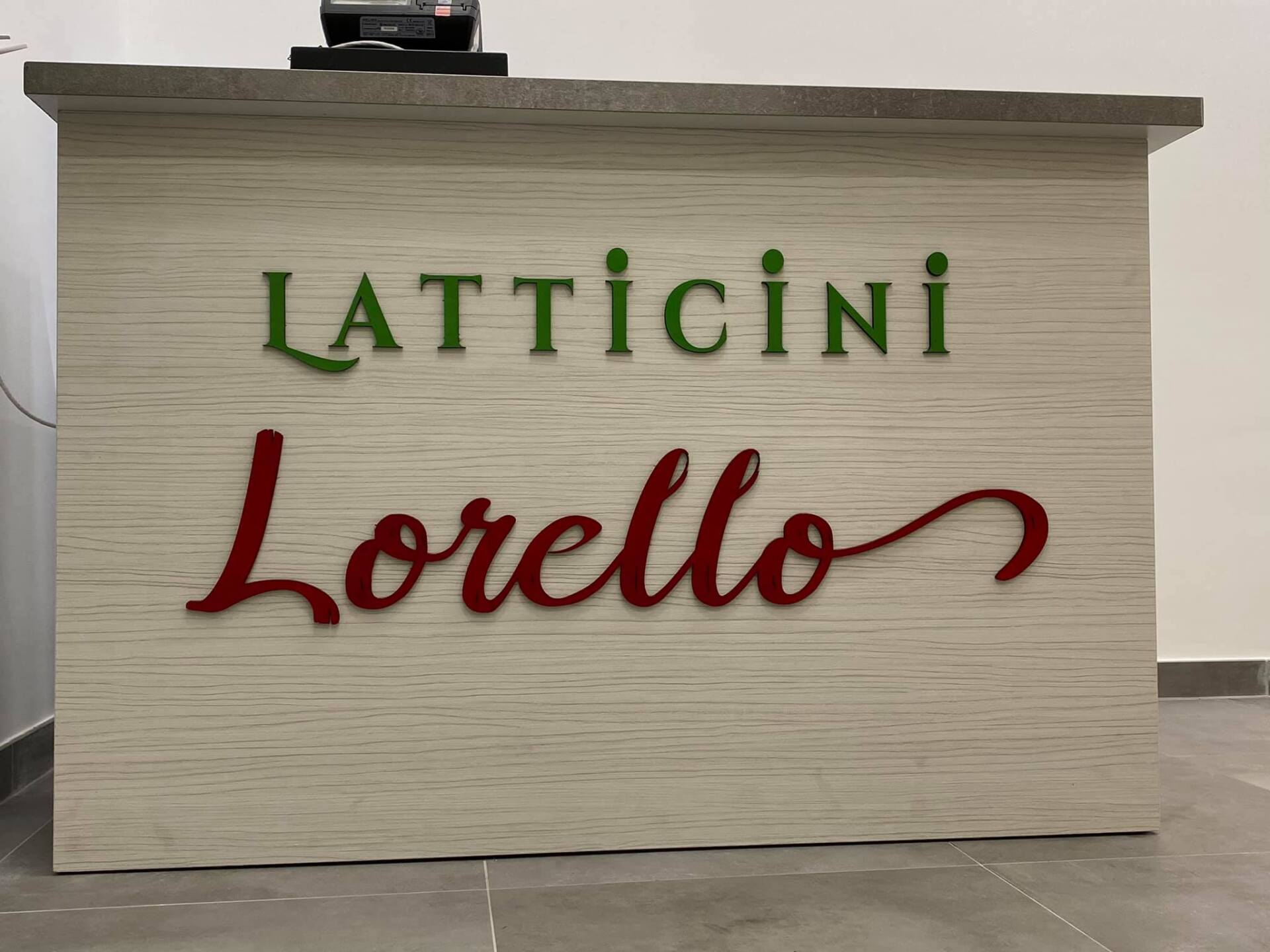 insegna negozio arredi delizia