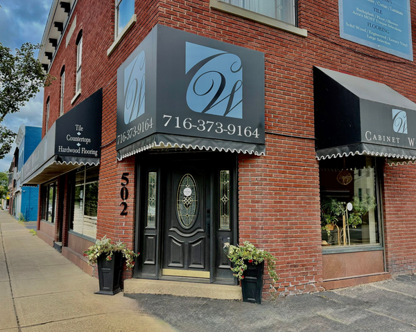 Corner brick building with awnings,