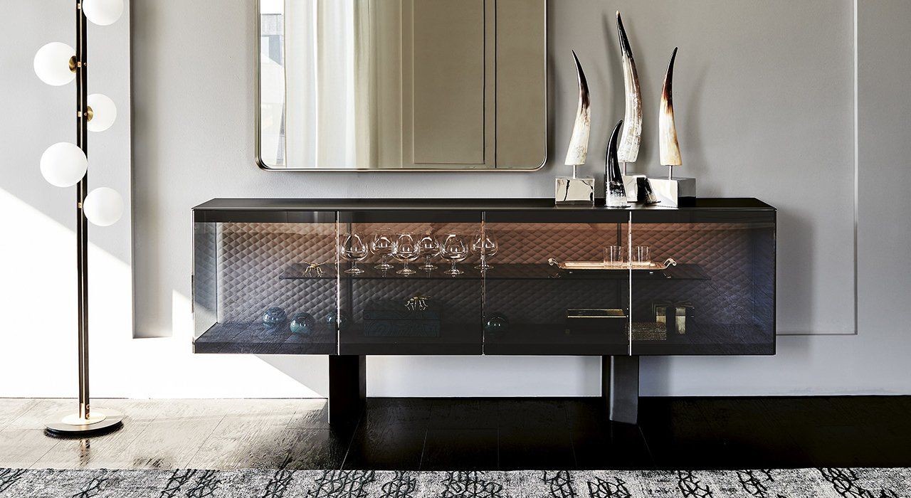 Cattelan Italia Boutique Sideboard,in Black with smoked glass doors or translucent Black glass doors, and optional LED lighting, in a dining or living room.