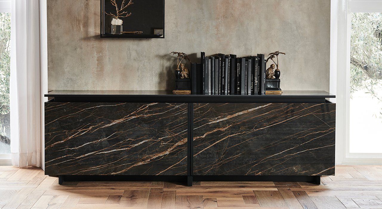 Cattelan Italia Europa Keramik sideboard Sliding doors, in 12 Ceramic finishes, with polished carcase and glass shelves inside in a living room.